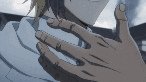 a close up of a hand on a person 's chest