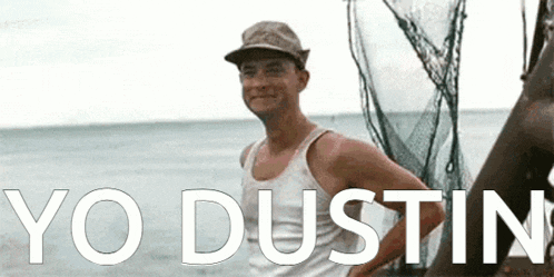 a man in a hat stands in front of a body of water with the words yo dustin on the bottom