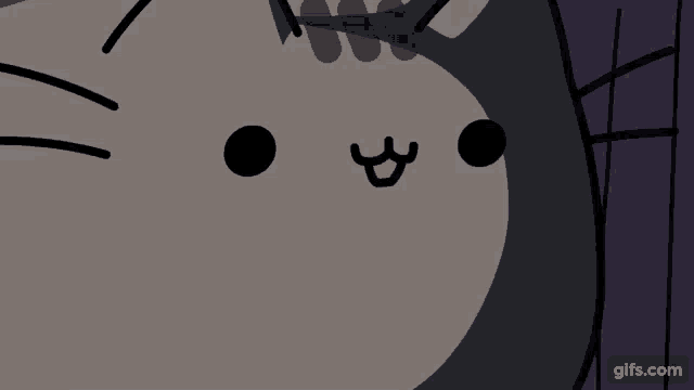 a close up of a cat 's face with the website gifs.com visible in the corner