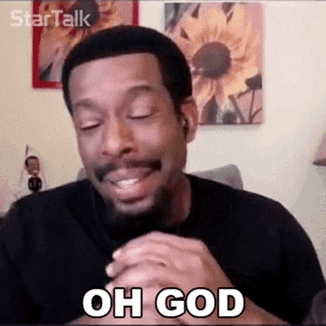 a man with a beard is making a face and saying oh god