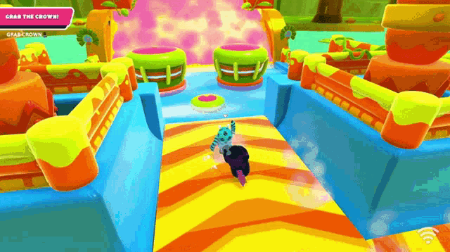 a video game is being played and the player is trying to grab the crown .