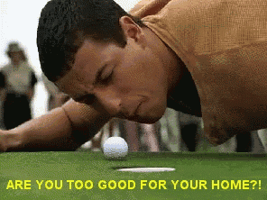 a man is laying on a golf course looking at a golf ball with the words " are you too good for your home " above him