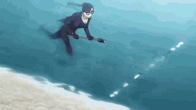 a woman in a wet suit is swimming in the ocean