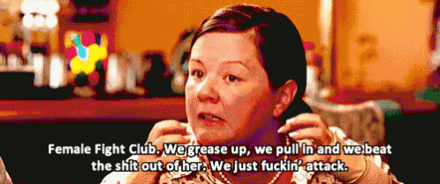 a pixelated image of a woman talking about a female fight club