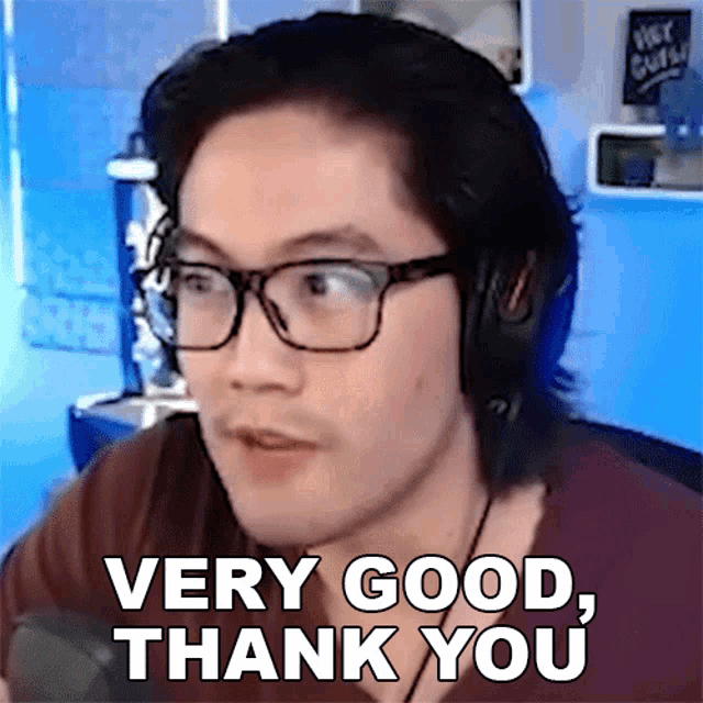 a man wearing glasses says very good thank you