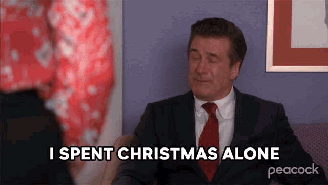a man in a suit and tie says i spent christmas alone on peacock