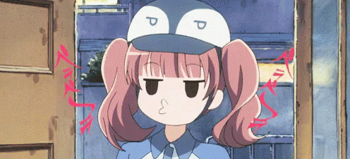 a girl with pigtails wearing a penguin hat with the letter p on it