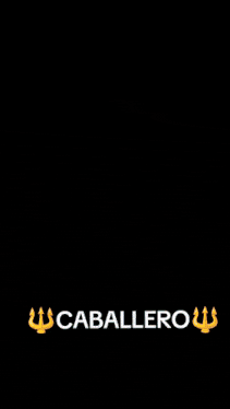 a man in a suit stands in front of a blue light that says caballero on it