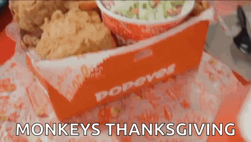 a box of popeye 's fried chicken is on a table