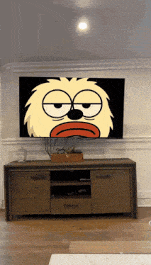 a tv with a cartoon character on the screen