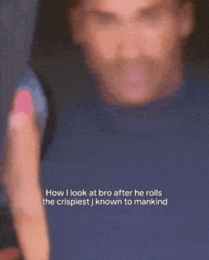 a man in a blue turtleneck with a caption that says how i look at bro