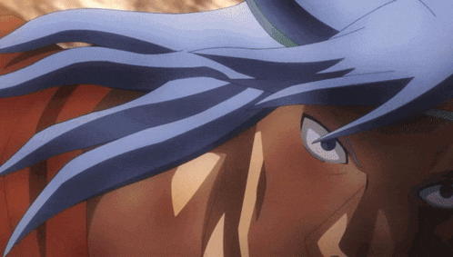 a close up of a person with blue hair