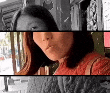 a woman in a red sweater is standing in front of a sign that says ella