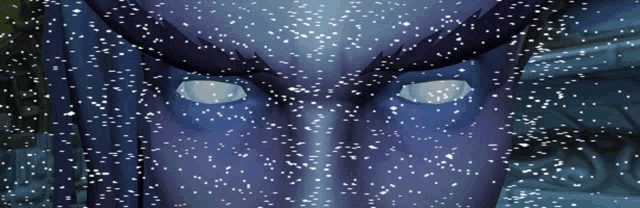 a close up of a person 's face covered in snow