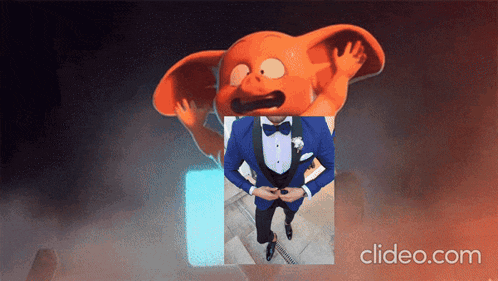 a man in a tuxedo is standing in front of a cartoon character and the website clideo.com is on the bottom right