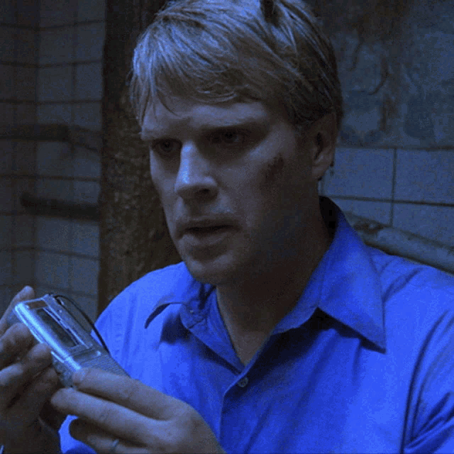 Listening To A Tape Cary Elwes GIF - Listening To A Tape Cary Elwes Lawrence Gordon GIFs