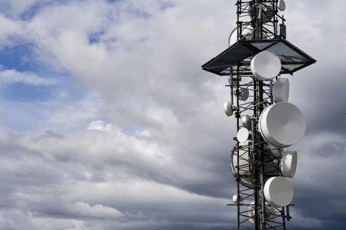 a very tall tower with a lot of antennas on it