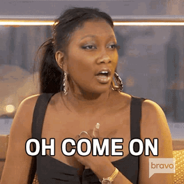 a woman in a black dress says oh come on bravo