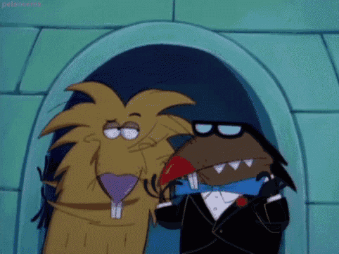 two cartoon characters are standing next to each other and one is wearing a tuxedo and bow tie .