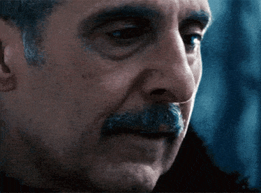 a close up of a man 's face with the words then who are you