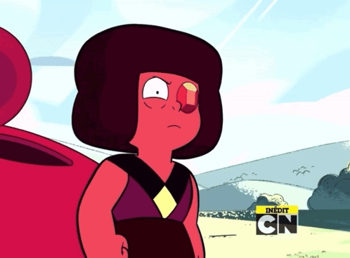 a cartoon character from cn is making a funny face in a field