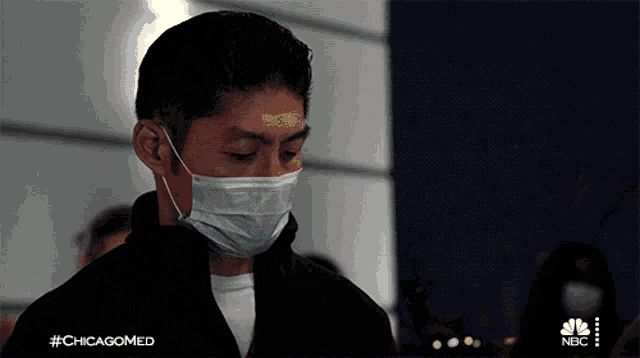 a man wearing a face mask has the hashtag #chicagomed