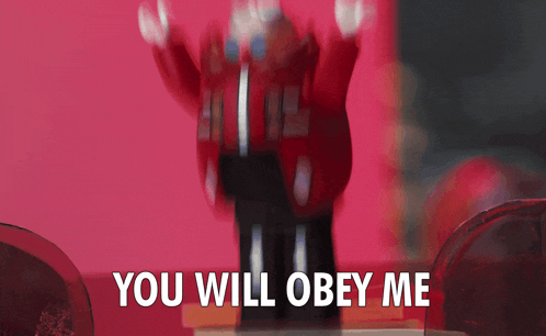 a lego figure says you will obey me in front of a red background