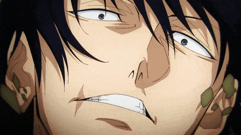 a close up of a man 's face with a very angry expression