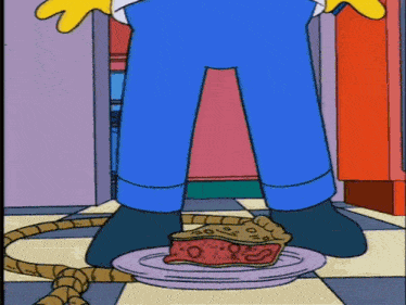 a cartoon character standing next to a piece of pie on a plate