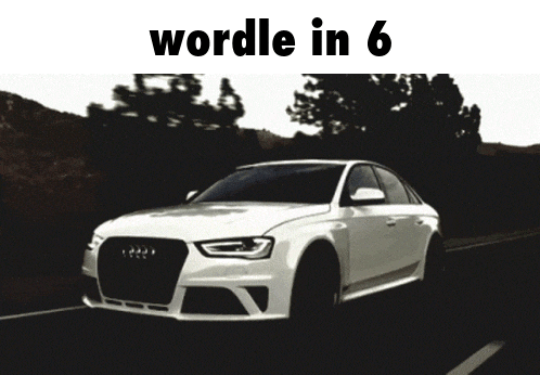 a white car is driving down a road with the words wordle in 6 written above it