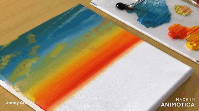a painting of a rainbow on a canvas is made in animatica
