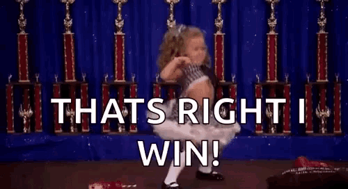 a little girl is dancing in front of trophies and the words `` that 's right , i win '' .