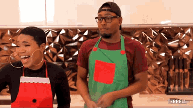 a man and a woman wearing aprons are standing next to each other with the words terrell.com below them
