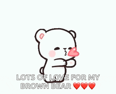 a brown teddy bear with a crown on its head is holding a pink heart balloon .