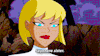 a cartoon character with blonde hair and red lips is looking at the camera