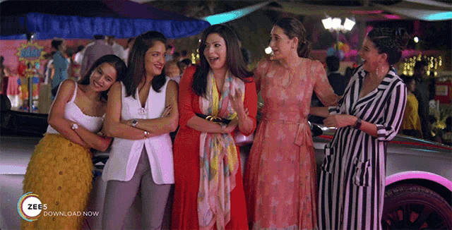 a group of women standing next to each other with the words zees download now on the bottom right