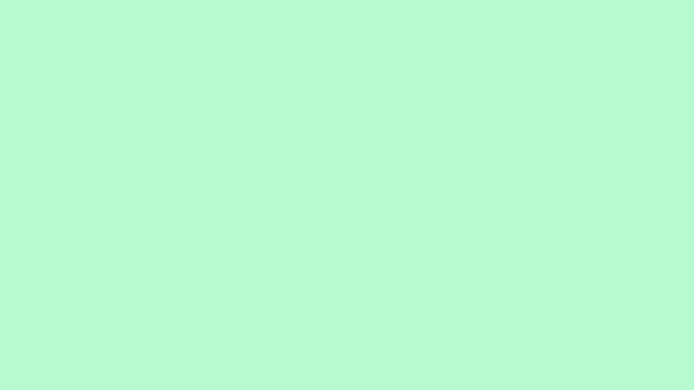 a smiley face with a slight smile on a green background .
