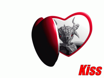 a couple of heart shaped mirrors with the word kiss on the top