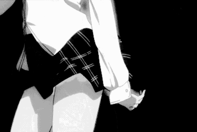 a black and white image of a girl with a bow tie