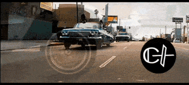 a car is driving down a street next to a sign that says ' express ' on it