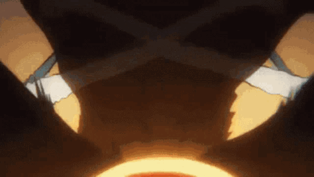 a close up of a person 's face in a dark room with a glowing light coming out of it .