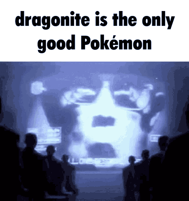 a group of people looking at a screen that says dragonite is the only good pokémon