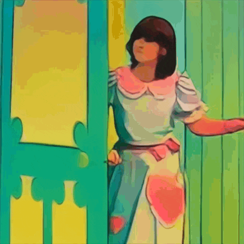 a woman in a white dress is standing in front of a door