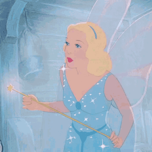 a woman in a blue dress is holding a wand with a star on it