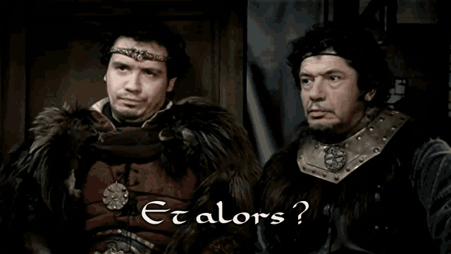 two men standing next to each other with et alors written on the bottom right