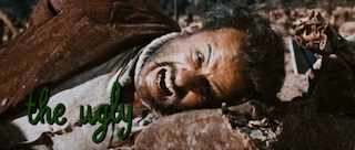 a man with a beard is laying on the ground with the words the ugly written above him
