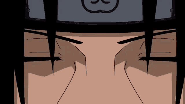 a close up of a person 's face with a headband on their head