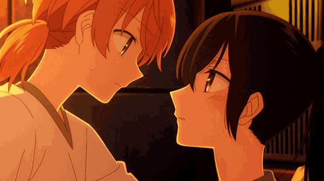 a couple of anime characters looking at each other with their eyes closed
