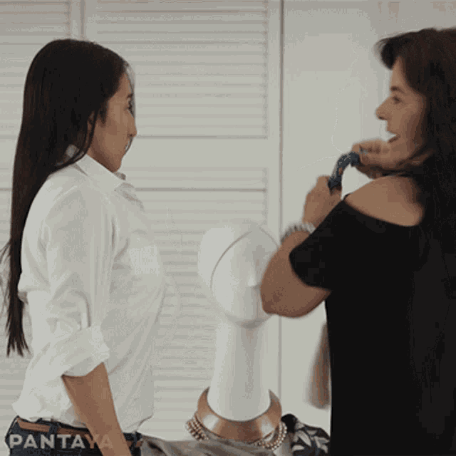 two women are standing next to each other with the word pantaya on the bottom