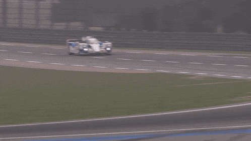 a racing car with the number 18 on it